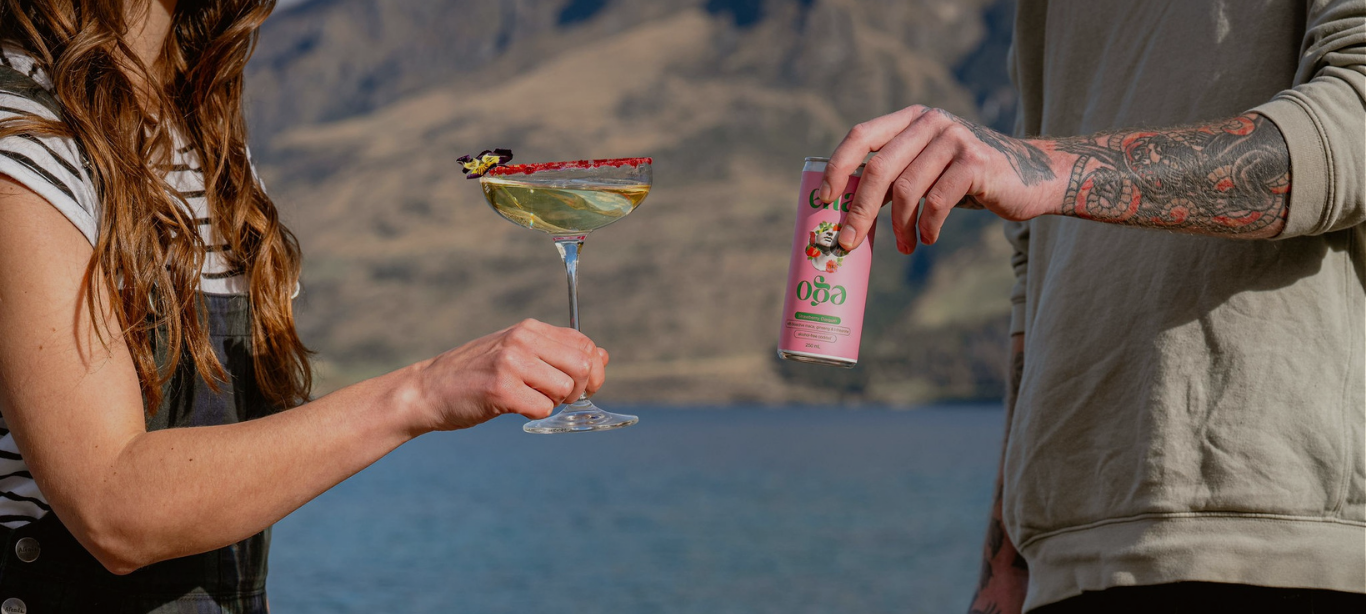 A man and woman cheering with alcohol free drinks for LONO club.